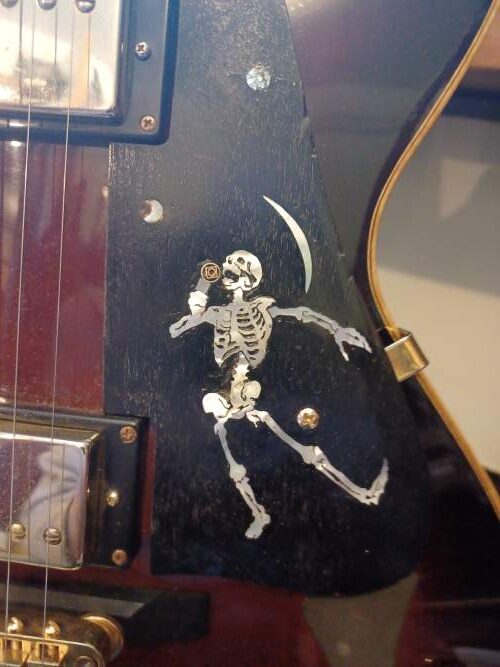 skeleton-inlay custom inlay in guitar.
